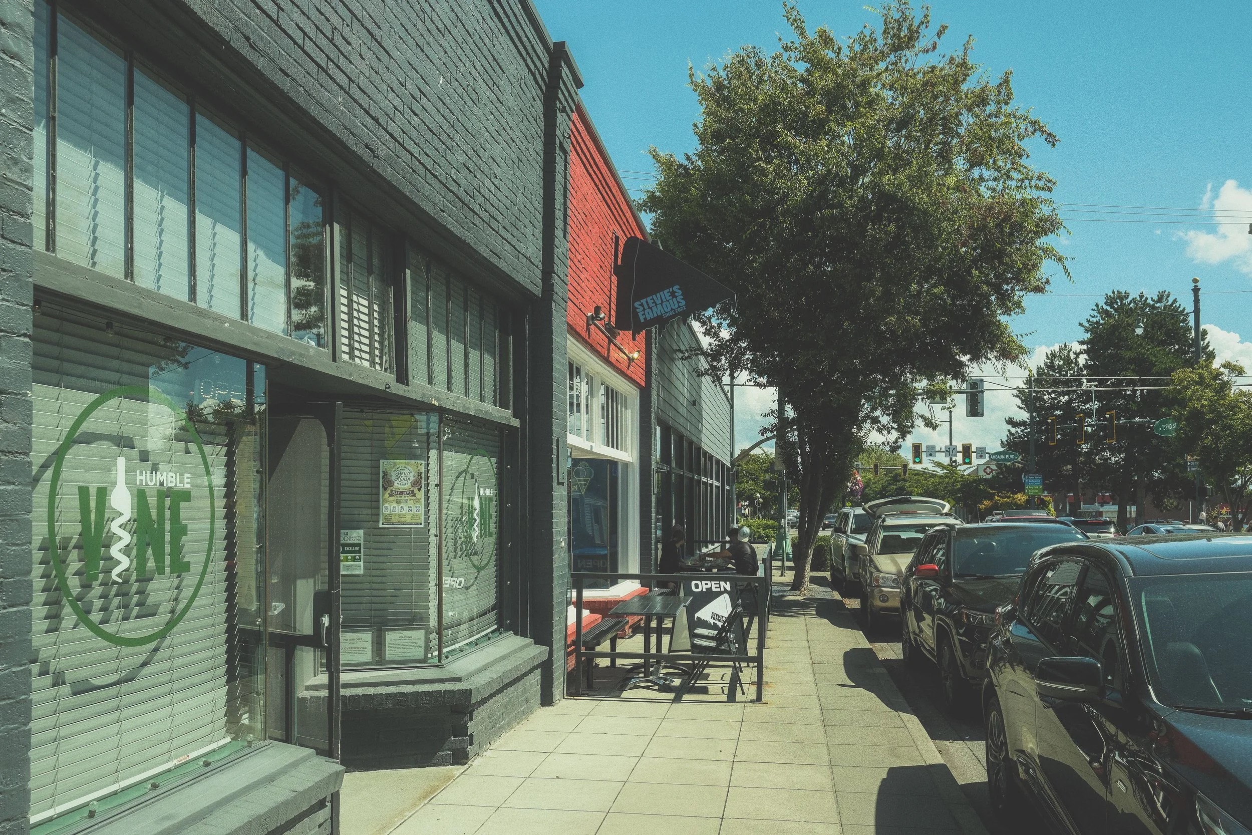 Storefronts on a sunny street