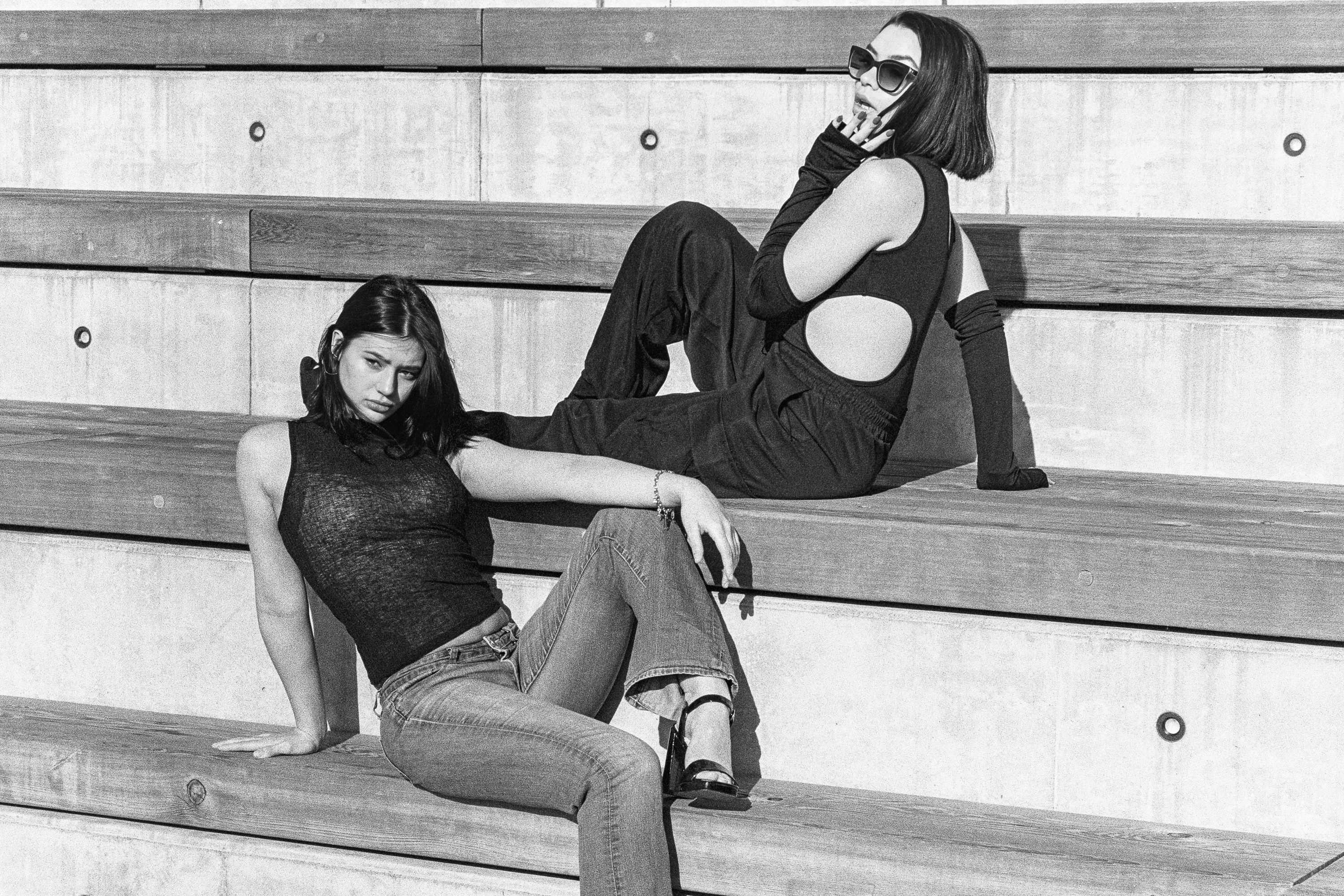 Two models on stepped bleachers
