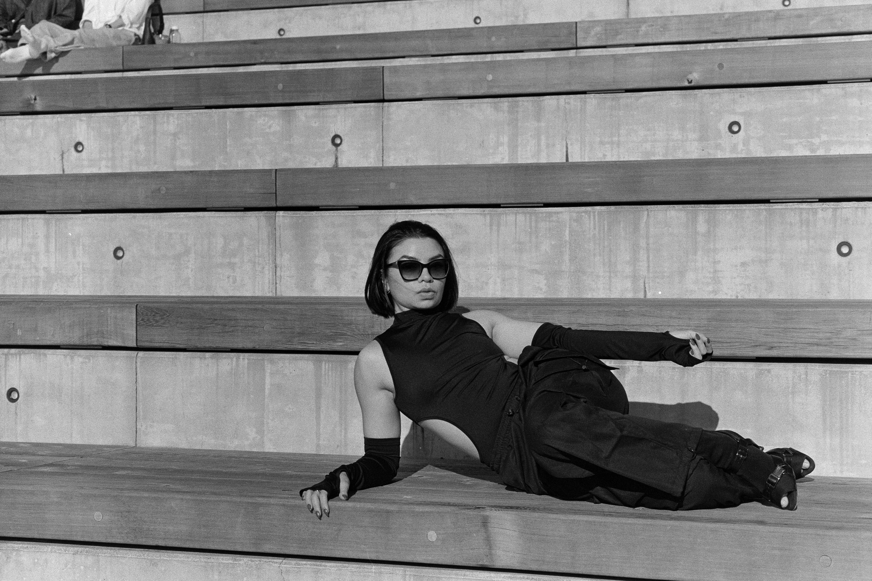 Reclining on the bleachers