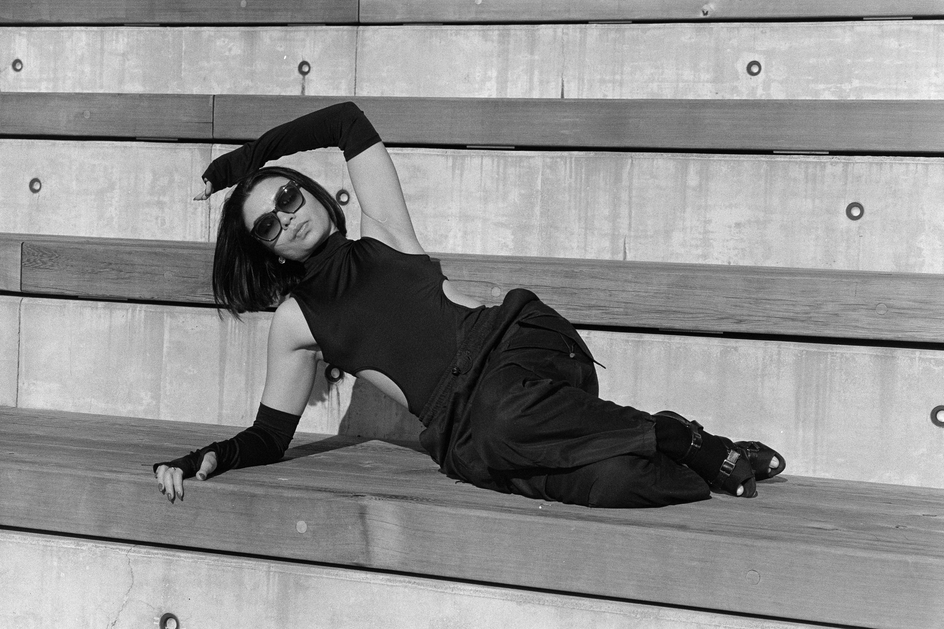 Reclining, arm overhead